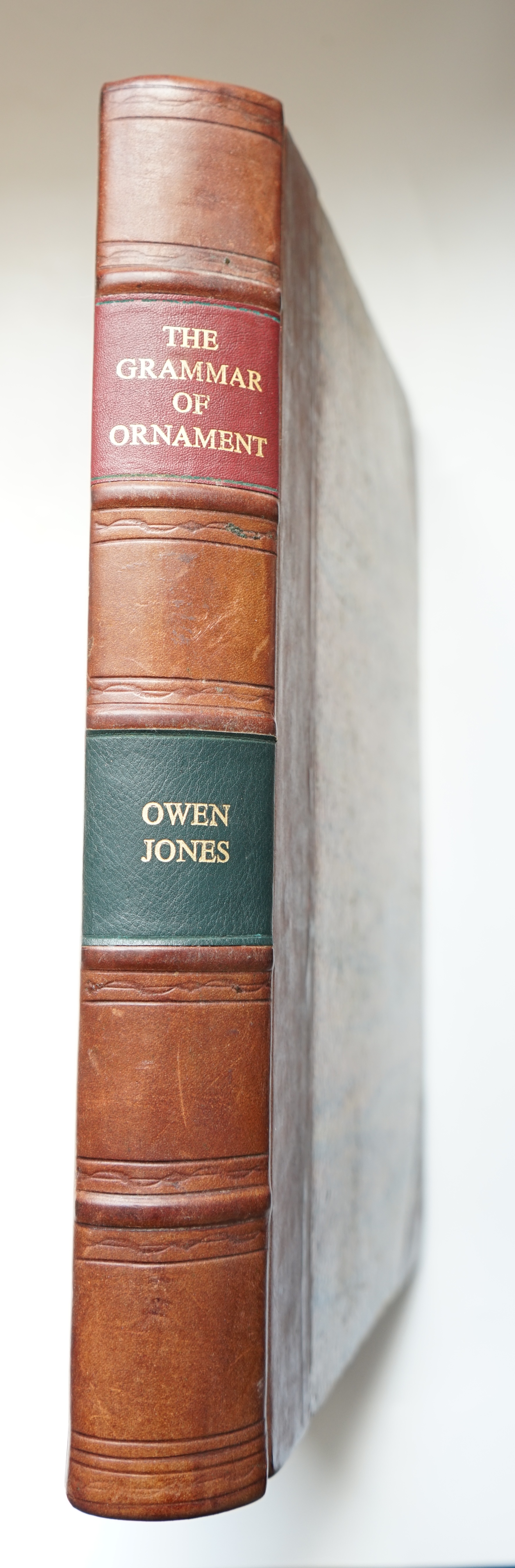 Jones, Owen - The Grammar of Ornament, chromolithograph title, 111 tissue guarded plates, text-illustrations, renewed half calf with marbled boards, renewed labels and endpapers, Bernard Quaritch, London, 1868.